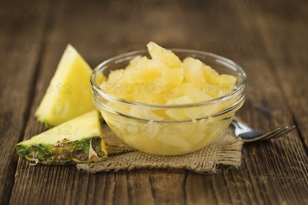 Portion of fresh Preserved Pineapple pieces close-up shot, selective focus