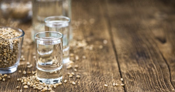 Portion of Wheat Liqueur as detailed close-up shot, selective focus