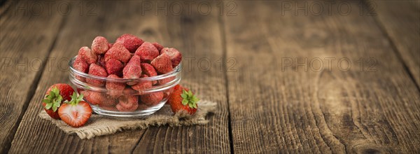 Dried Strawberries on a vintage background as detailed close-up shot, selective focus