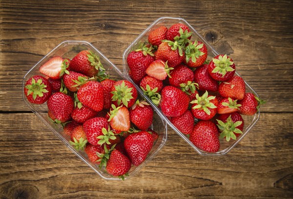 Strawberries on a vintage background as detailed close-up shot, selective focus