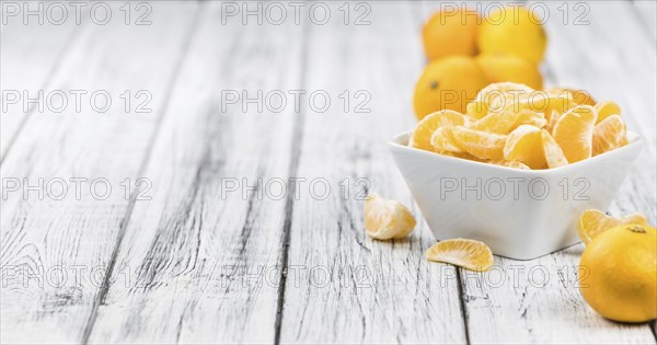 Portion of tangerines (close-up shot) on a vintage background (selective focus)