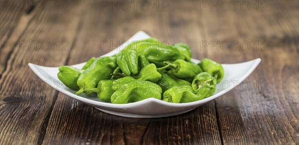 Portion of fresh Raw Pimientos close-up shot, selective focus