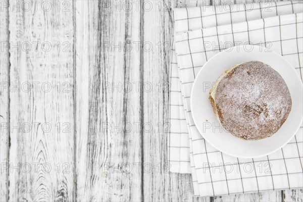 Portion of Berliner Doughnuts as detailed close-up shot, selective focus