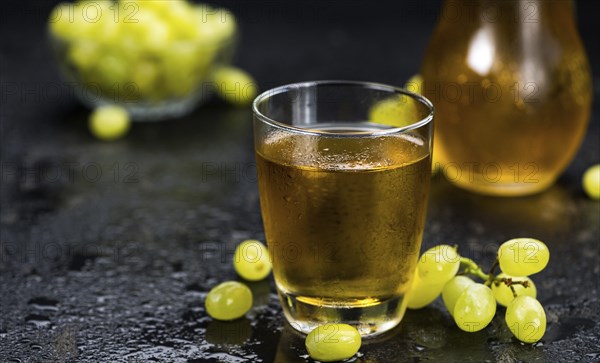 Some healthy Grape Juice (selective focus, close-up shot)