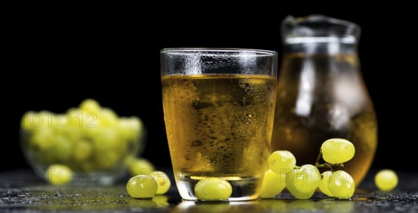 Some healthy Grape Juice (selective focus, close-up shot)