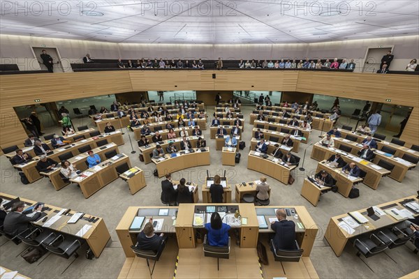 State parliament of Baden-Württemberg, assembly hall with state coat of arms. The seats of the