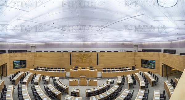 State parliament of Baden-Württemberg, assembly hall with state coat of arms. The seats of the