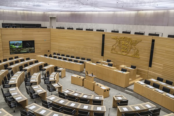 State parliament of Baden-Württemberg, assembly hall with state coat of arms. The seats of the