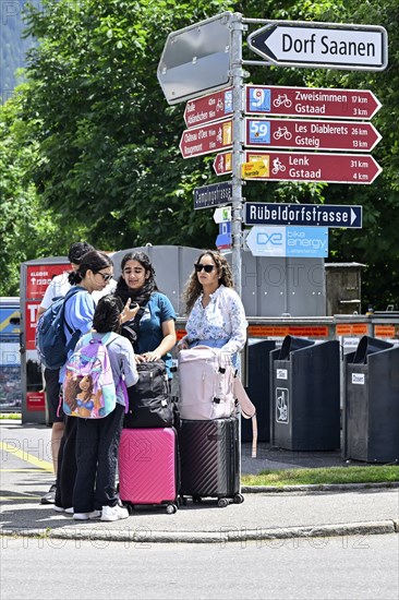 Indian tourists with luggage