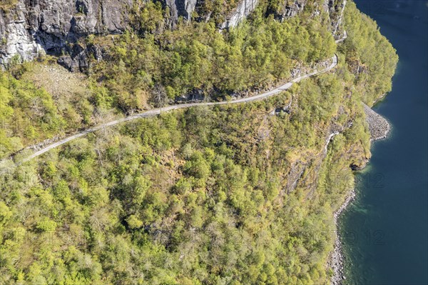 Aerial view of lake Lovatnet (or: Loenvatnet), gravel mountain road to Kjenndalstova, valley