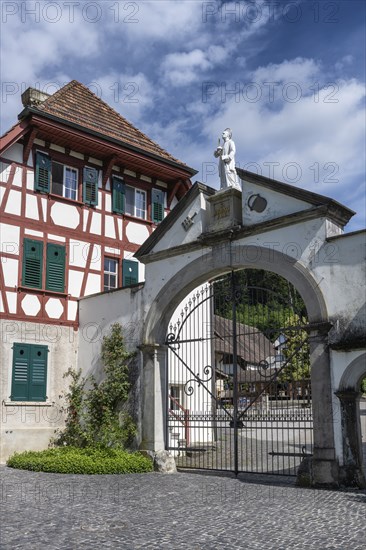 Lower entrance to Ittingen Charterhouse, a former Carthusian monastery with a statue of Bruno of