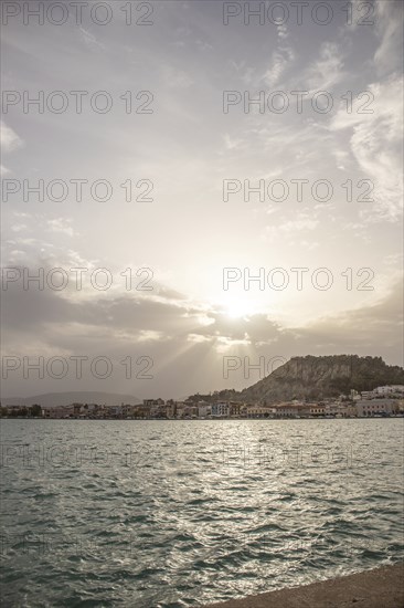 Great typical Greek town and buildings. Mediterranean cityscape in the evening at sunset on