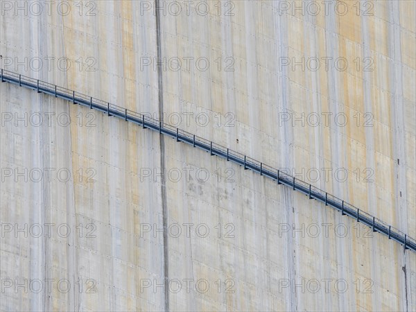 Barrage de Mauvoisin, detail of the concrete dam, steel construction along the dam, Switzerland,