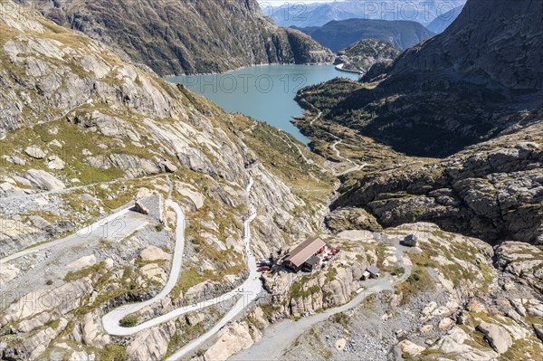 Aerial view of reservoir Lac d' Emosson, mountain hut Cabane Vieux Emosson, Finhaut, Switzerland,