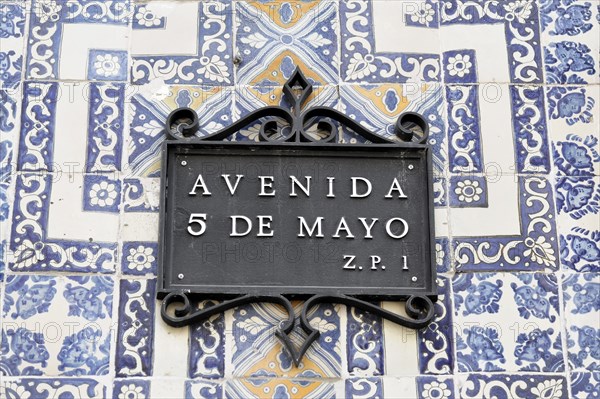 Mexico City, Mexico, Central America, Decorative street sign with blue and white tiles indicating