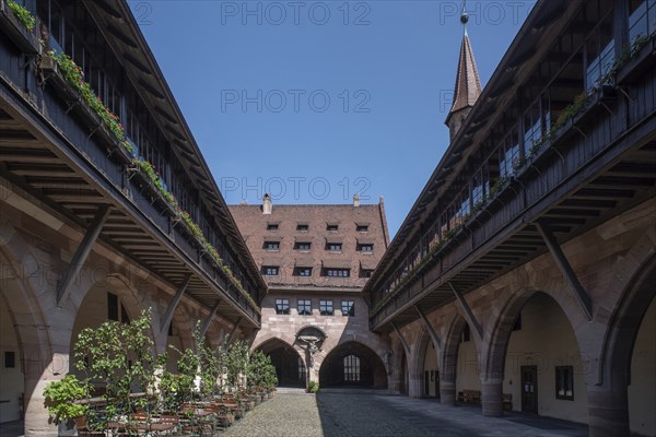 Inner courtyard of the historic Heilig-Geist-Spital, Nuremberg, Middle Franconia, Bavaria, Germany,