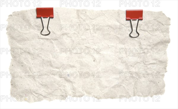 Grunge Torn Paper With Red Clips Isolated On White Background. Ready for your message