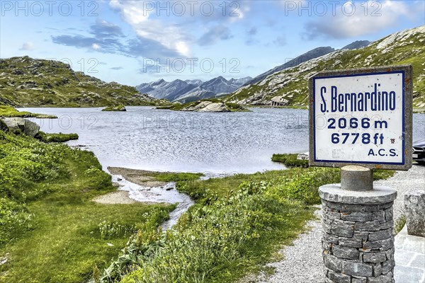Pass marker sign at pass summit of mountain pass in Alps Passo San Bernardino San Bernardino Pass