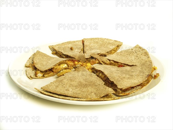 Quesadilla with chicken and maze under oatmeal tortilla