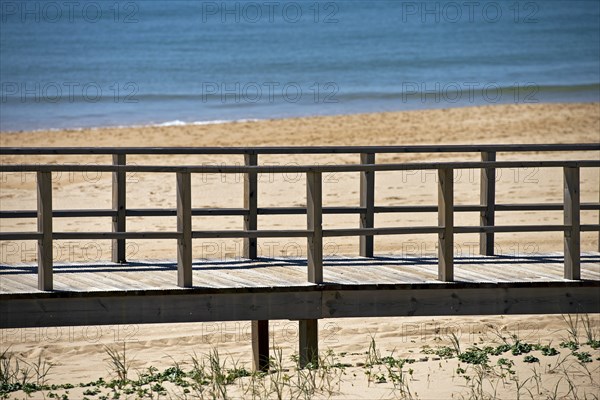 Wooden pier on the beach Wooden pier