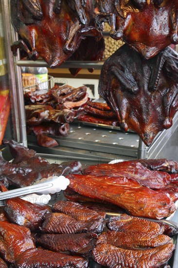 Smoked geese and ducks at a market in Bangkok