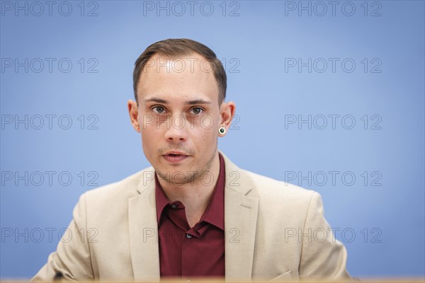 Silas Kropf, Chairman of the Board of MIA e.V., recorded during the Federal Press Conference for
