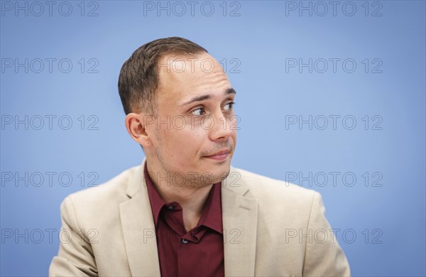 Silas Kropf, Chairman of the Board of MIA e.V., recorded during the Federal Press Conference for