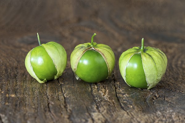 Closeup of tomatillos on a chopping board