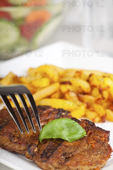Juicy pork steak with chips