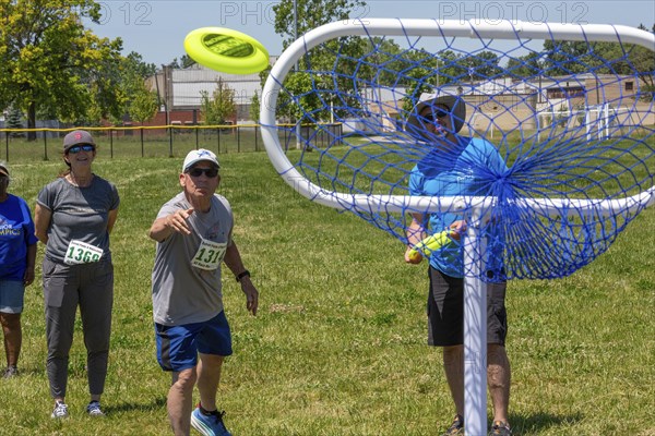Detroit, Michigan, The Frisbee Toss at the Detroit Senior Olympics. The three-day competition for