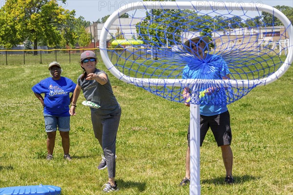 Detroit, Michigan, The Frisbee Toss at the Detroit Senior Olympics. The three-day competition for