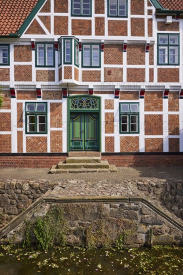 Stairs from the Jorker Hauptwettern moat to the town hall in Jork, Altes Land, Stade district,
