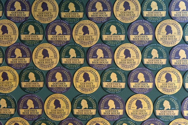 Beer mat with the portrait of Goethe as wall decoration in Goethe's Bierhaus, Karlsbad, Karlovy
