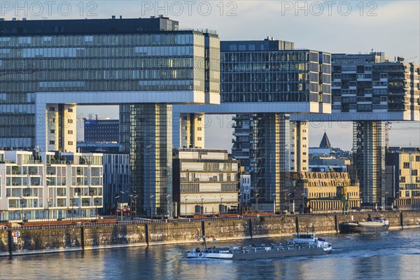 Crane houses in the Rheinau harbour, seen across the Rhine from the south bridge, Cologne, North