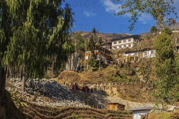 View of the Trongsa Dzong on a sunny day with blue sky