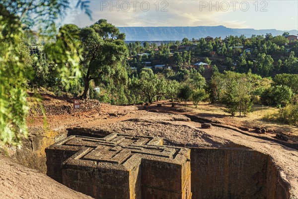 Church of Saint George or Bet Giyorgis in Amharic in the shape of a cross. The churches of Lalibela