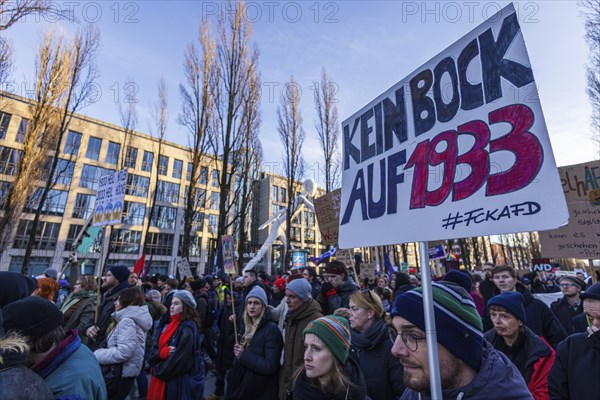 People holding banners against the right wing party AfD at a manifastation in Munich, Germany,