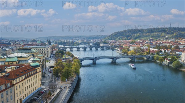 View onto the Vltva river and its bridges in an aerial view