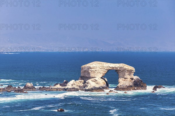 The famous natural landmark La Portada Rock Formation