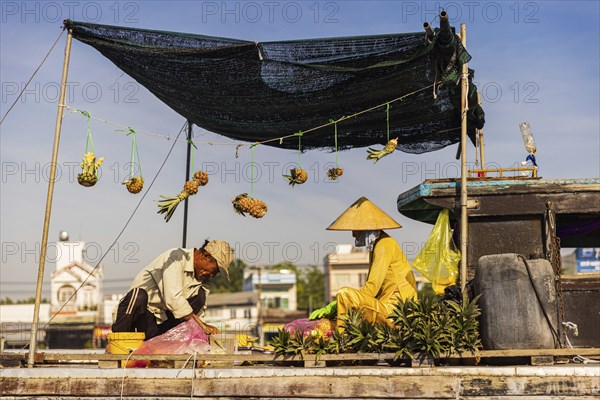 Fruit merchant at Cai Rang Floating Market on the Mekong river