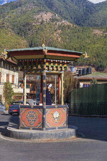 Local policeman directing the traffic in Thimphu