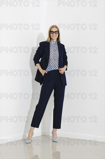 Professional blonde woman representing a modern corporate fashion