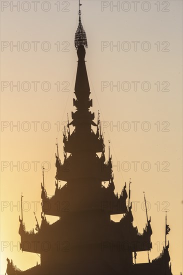 Pagoda silhouette during a sunset in Mandalay, Myanmar (Burma)
