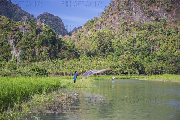 Man throwing out his net