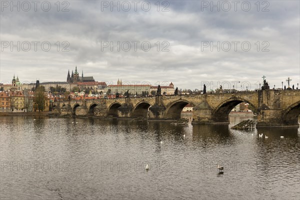 Charles Bridge in Prague on a beautiful autumn day