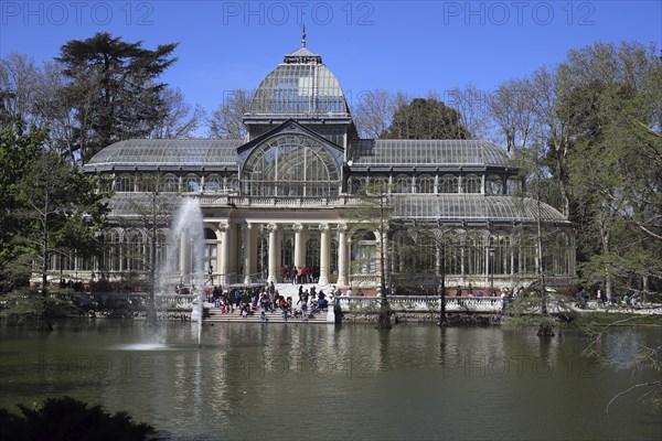 Palacio de Cristal, Parque del Retiro, Spain Crystal palace surrounded by spring green. Front view