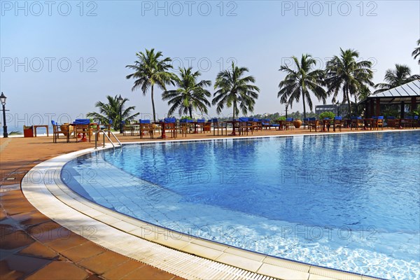 Luxurious Hotelpool in Mount Lavinia. In the background the skyline of Colombo