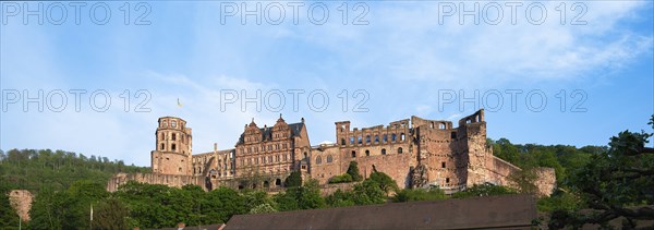 Heidelberg, mediaevial castle, red sandstone ruins tower looms majestically over the Neckar river