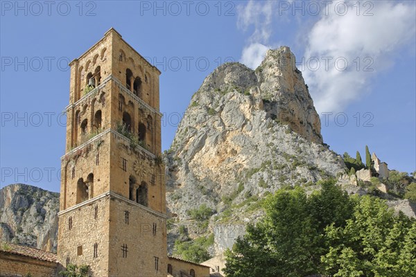 Church tower of Notre-Dame-de-l'Assomption and rock with Notre-Dame de Beauvoir church, cliffs,