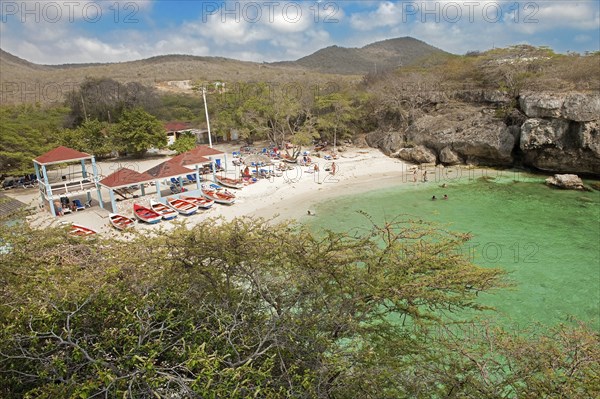View from elevated position on small sandy beach Playa Lagun in bay on Caribbean Sea, Caribbean,